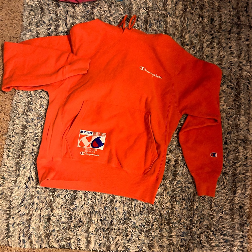 Bright hazard orange color champion reverse weave hoodie
